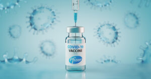 Sofia, Bulgaria - November 10, 2020: Pfizer COVID-19 Coronavirus Vaccine and Syringe. Conceptual image. Sofia, Bulgaria - November 10, 2020: Pfizer COVID-19 Coronavirus Vaccine and Syringe. Conceptual image.
