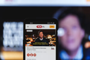 Moscow, Russia - 2024 February 7: Tucker Carlson network website on smartphone screen.